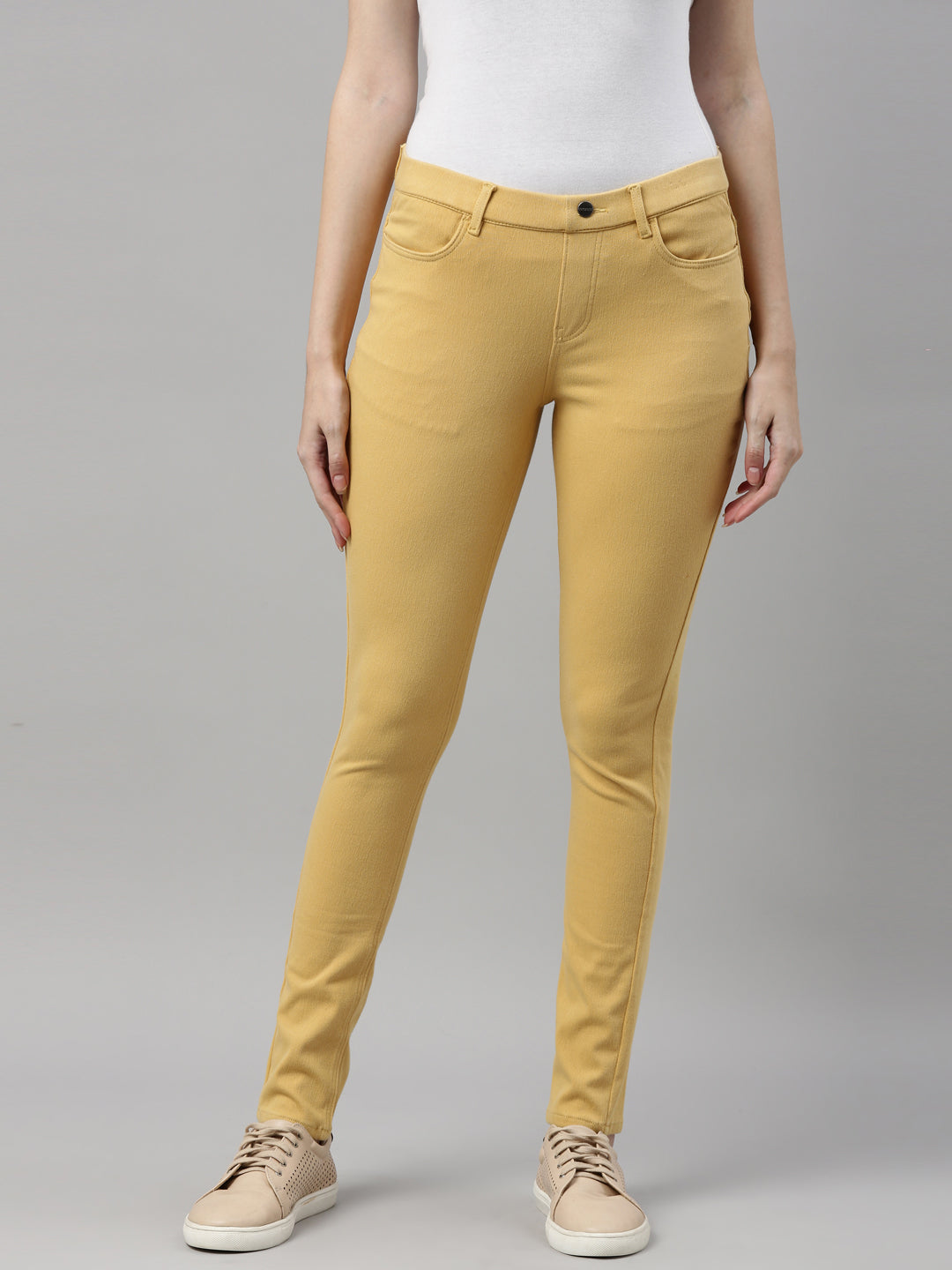 Women Solid Golden Yellow Super Stretch Jeggings