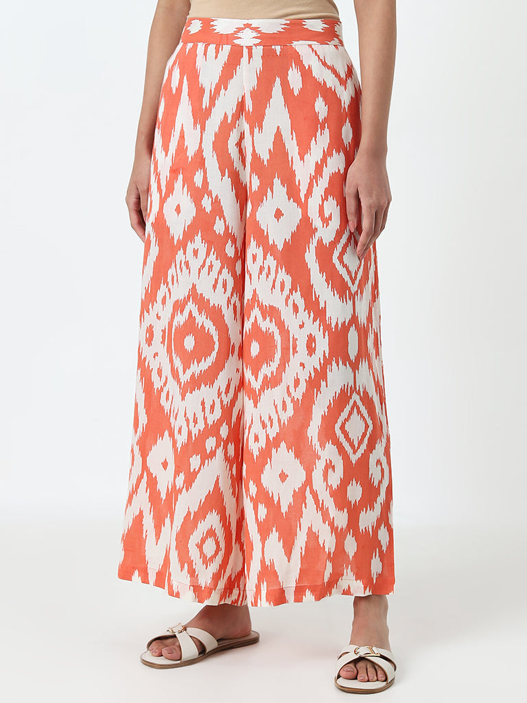 Utsa Orange Ikat Printed High-Rise Cotton Blend Palazzos