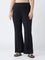 Diza Black Solid Flared Pants
