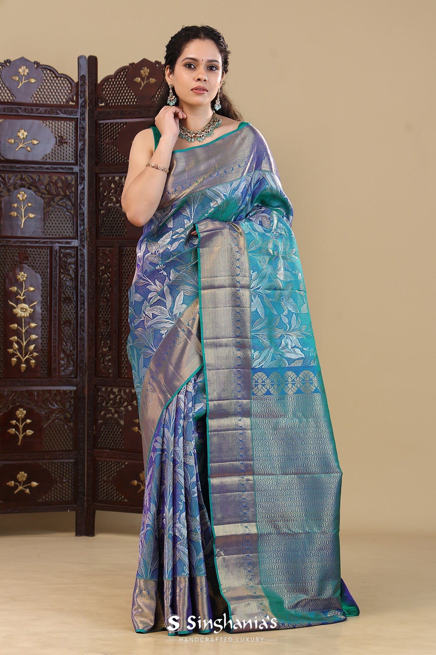 Bright Teal Blue Kanjivaram Saree With Floral Gold Zari