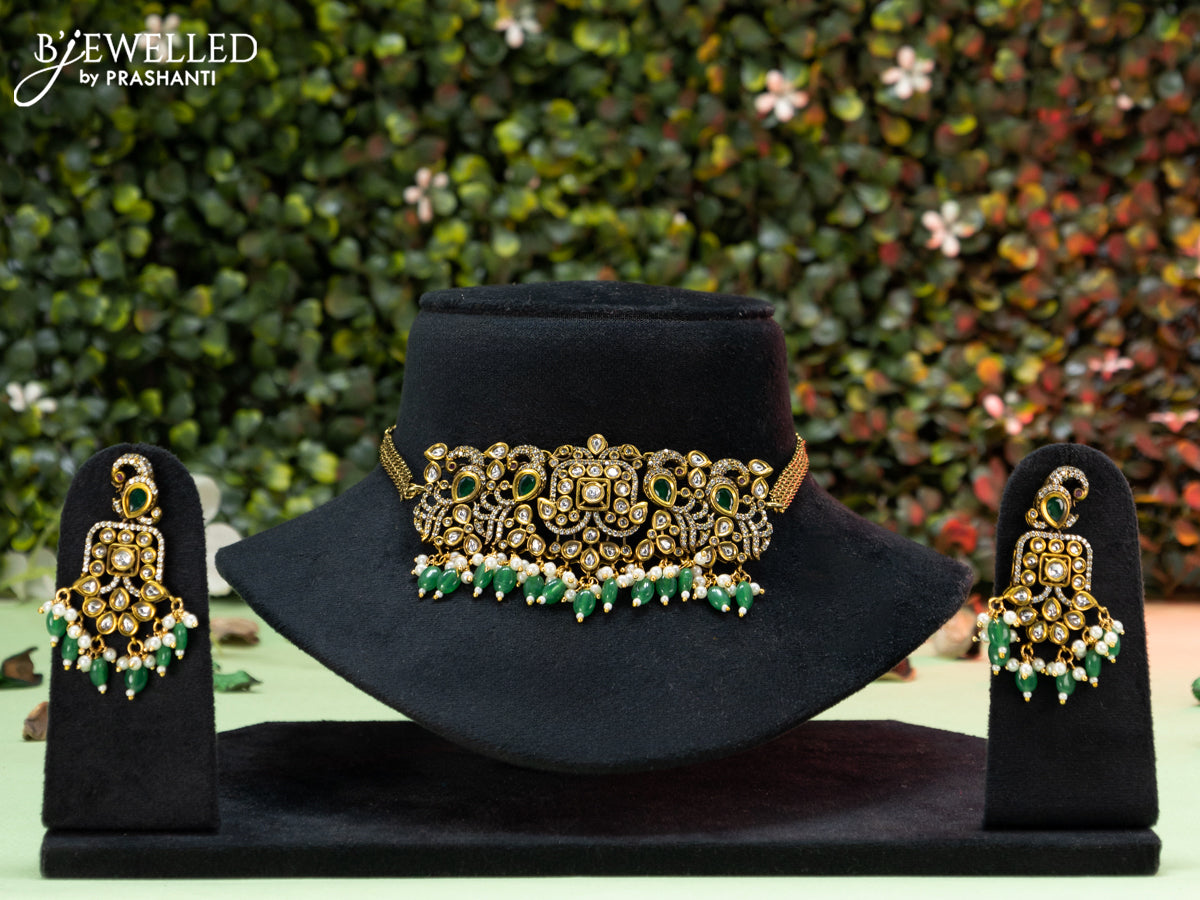 Choker peacock design with emerald & cz stones and beads hangings in victorian finish