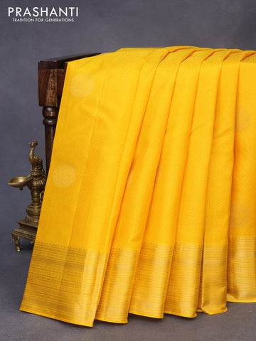 Pure kanchipuram silk saree mango yellow and pink with allover self emboss & buttas and zari woven border