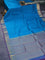 Pure kanchipuram silk saree peacock blue and dual shade of bluish pink with allover self emboss and zari woven border