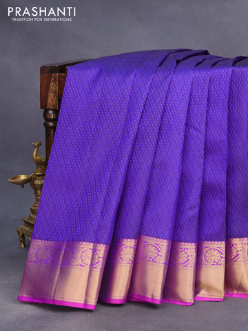 Pure kanchipuram silk saree blue and purple with allover self emboss & zari weaves and floral zari woven border