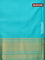 Pure kanchipuram silk saree dual shade of pinkish orange and teal blue with zari woven buttas and zari woven border