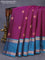 Pure kanchipuram silk saree dark magenta pink and peacock blue with allover self emboss & zari weaves and rettapet zari woven border