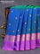 Pure kanchipuram silk saree dual shade of bluish green and purple with zari woven buttas and zari woven border