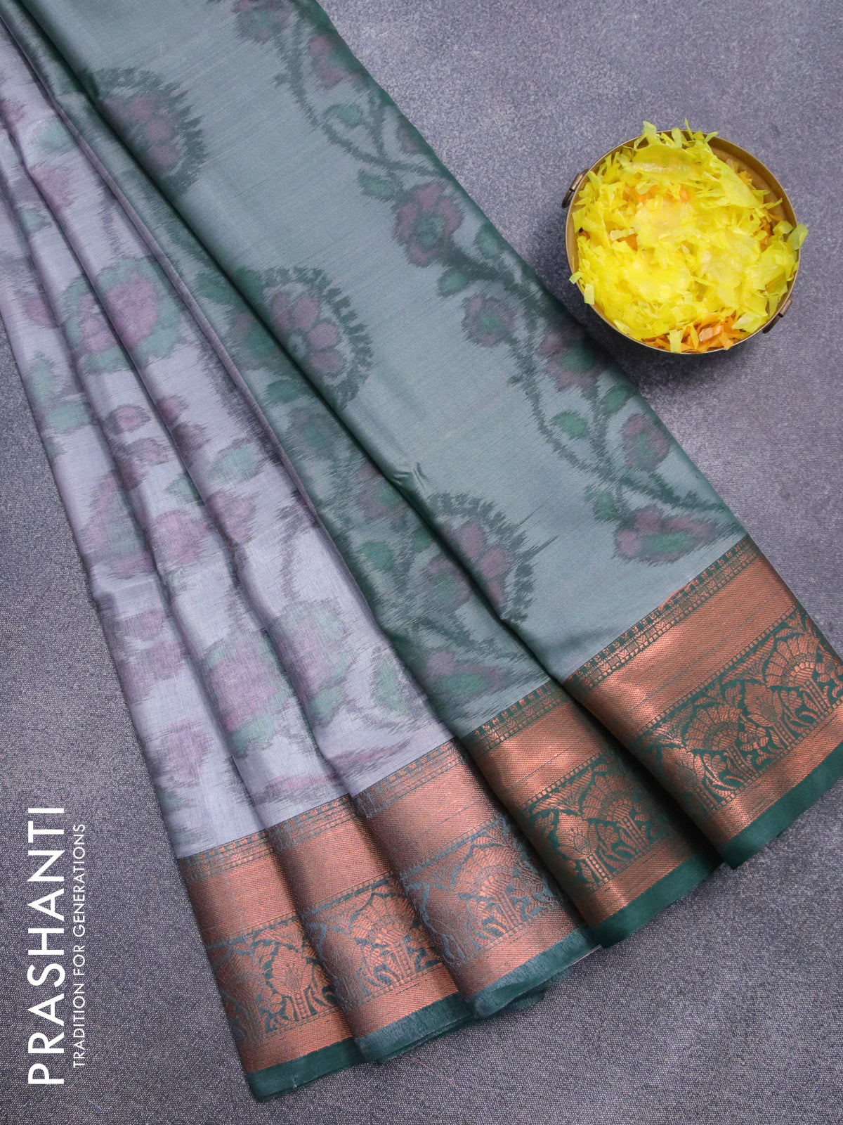 Banarasi semi tussar saree grey and green with allover ikat weaves and long zari woven border