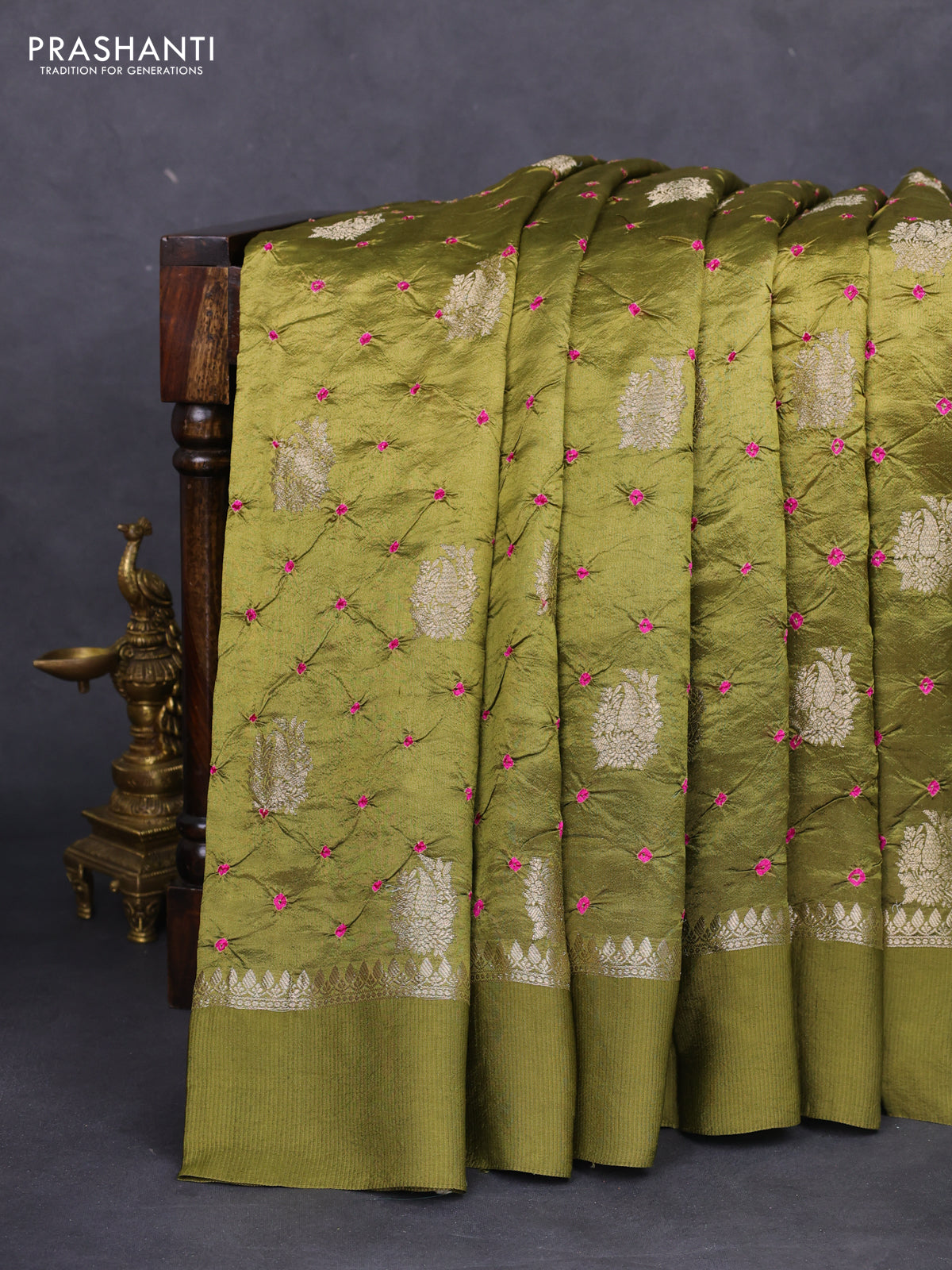 Chiniya silk saree sap green with allover zari buttas & bandhini prints and zari woven simple border