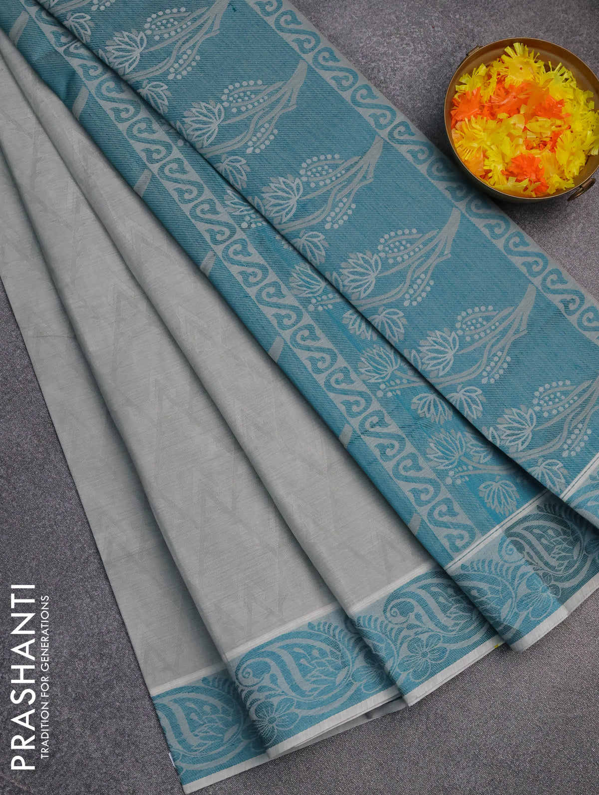Coimbatore cotton saree grey and teal green with allover self emboss and thread woven border