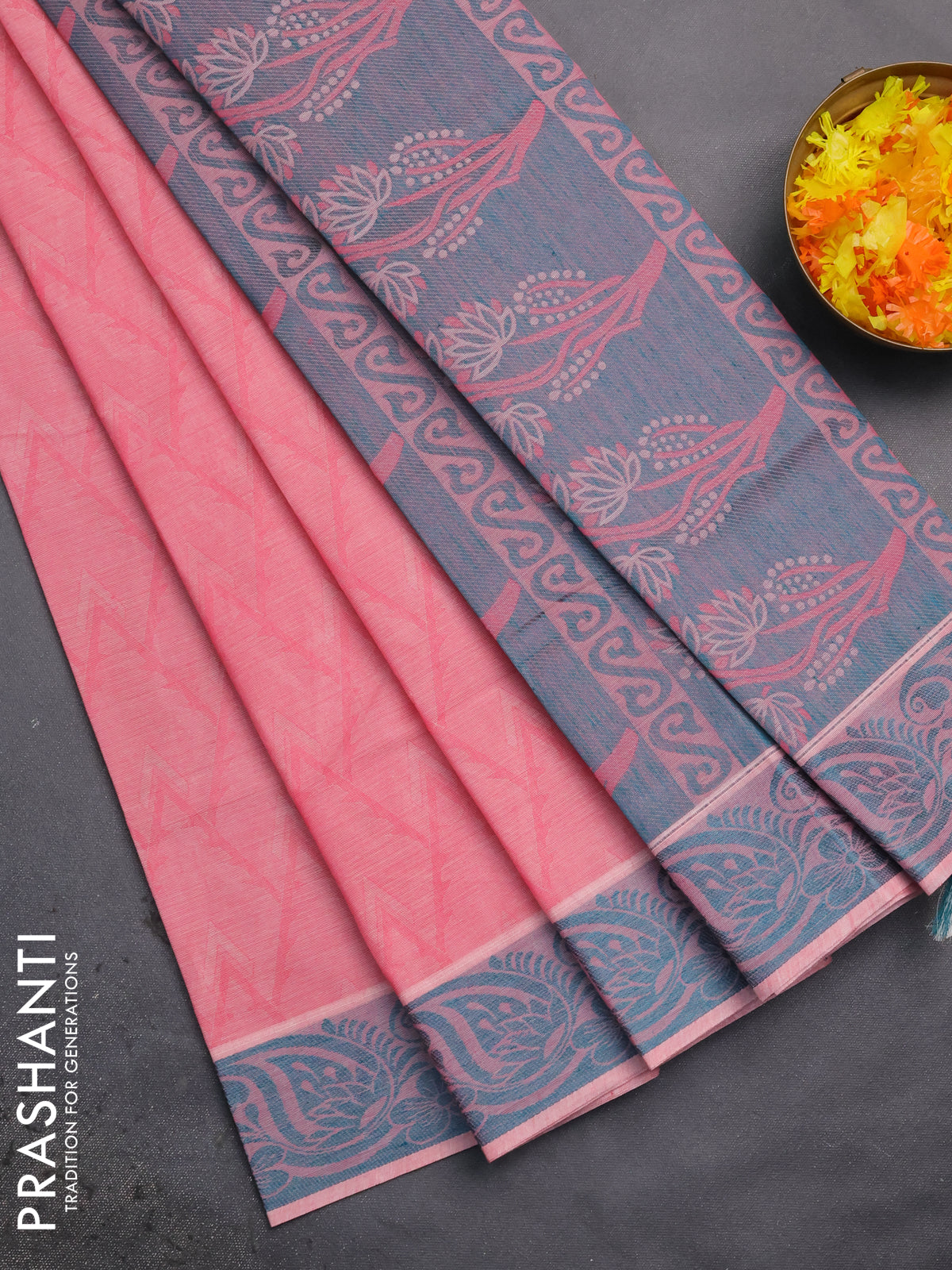 Coimbatore cotton saree peach pink and teal green with allover self emboss and thread woven border
