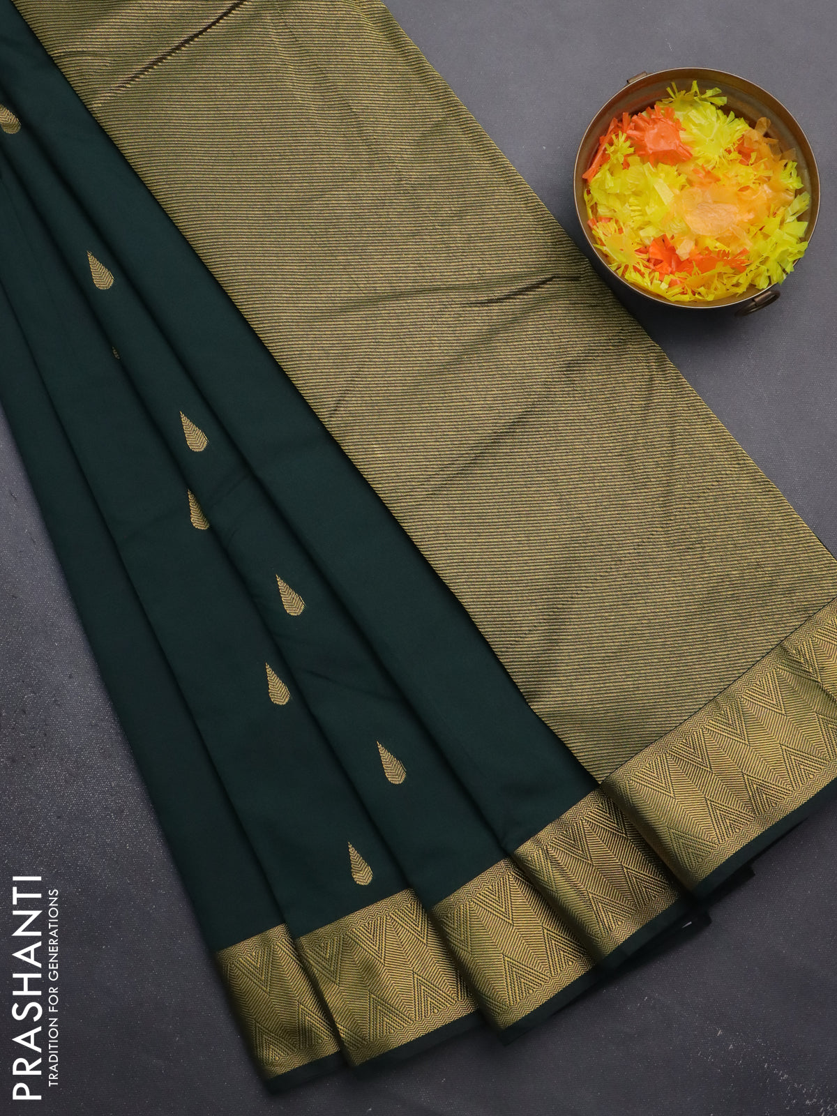 Arani semi silk saree bottle green with zari woven thilak buttas and zari woven border