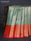 Bangalori tissue silk saree teal green shade and reddish pink with allover zari woven brocade weaves and long zari woven border
