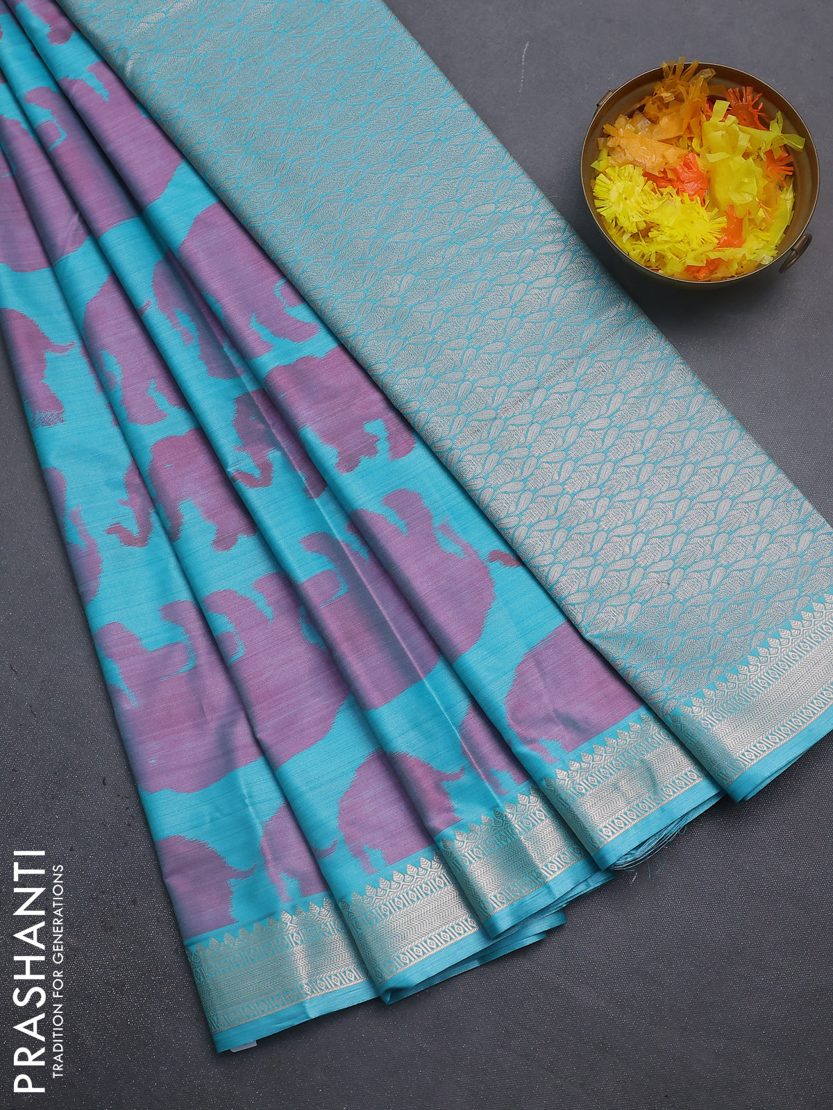 Bangalori semi silk saree teal blue with allover elephant ikat butta weaves and zari woven border