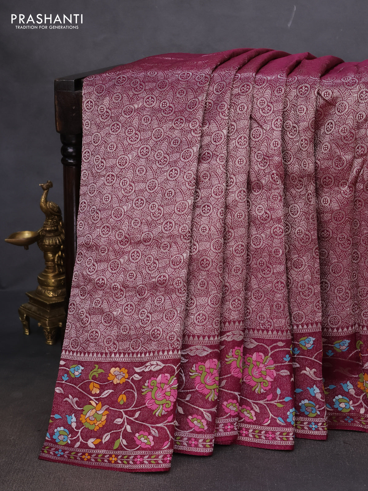 Banarasi semi raw silk saree wine shade with allover silver zari woven brocade weaves and floral design paithani border