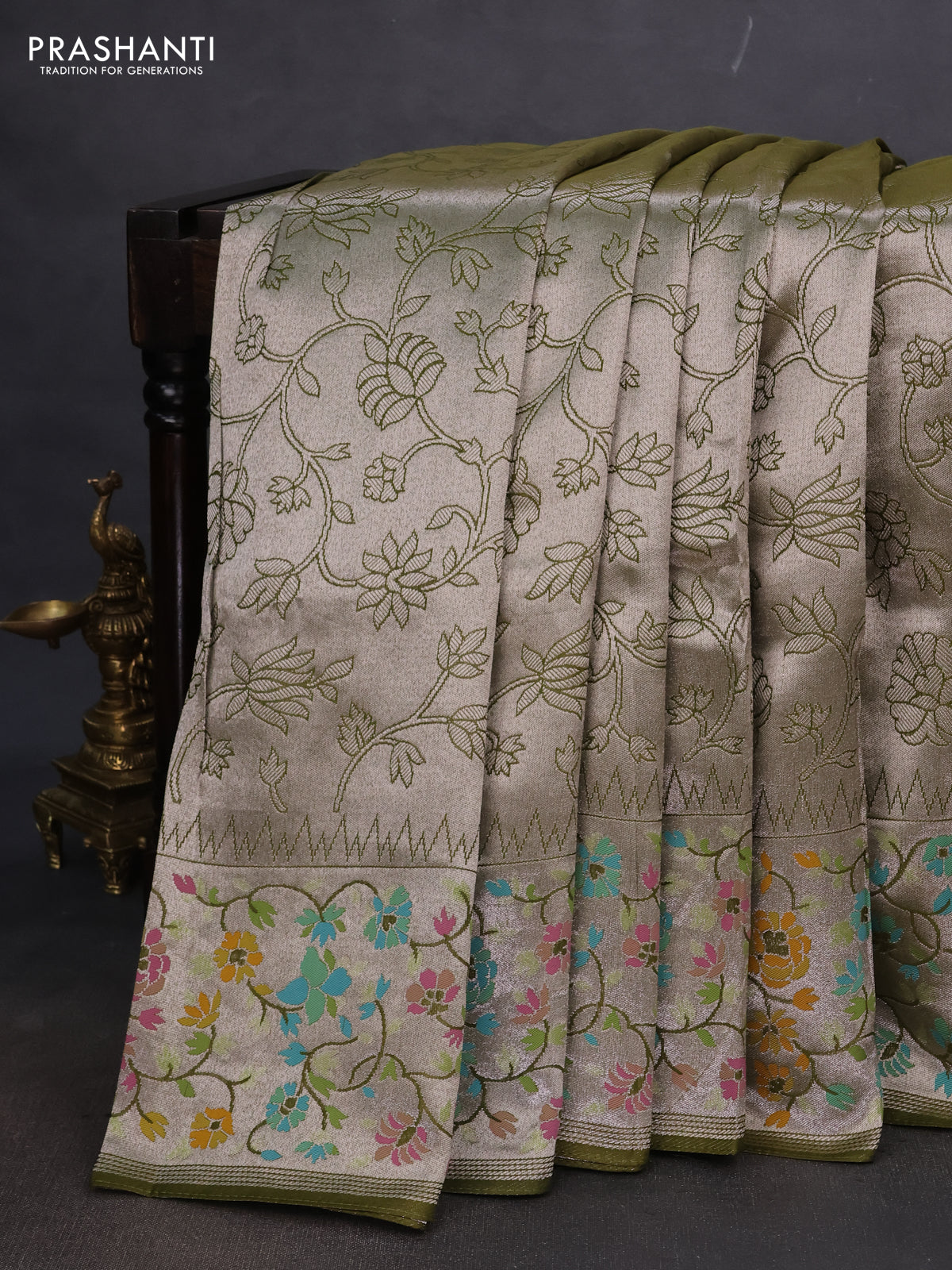 Banarasi semi raw silk saree mehendi green with allover silver zari woven floral weaves and floral design paithani border