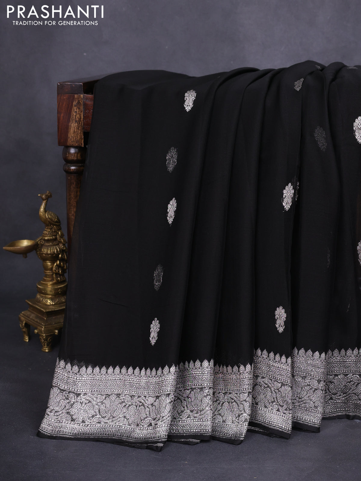 Banarasi chiffon silk saree black with silver zari woven buttas and floral silver zari woven border