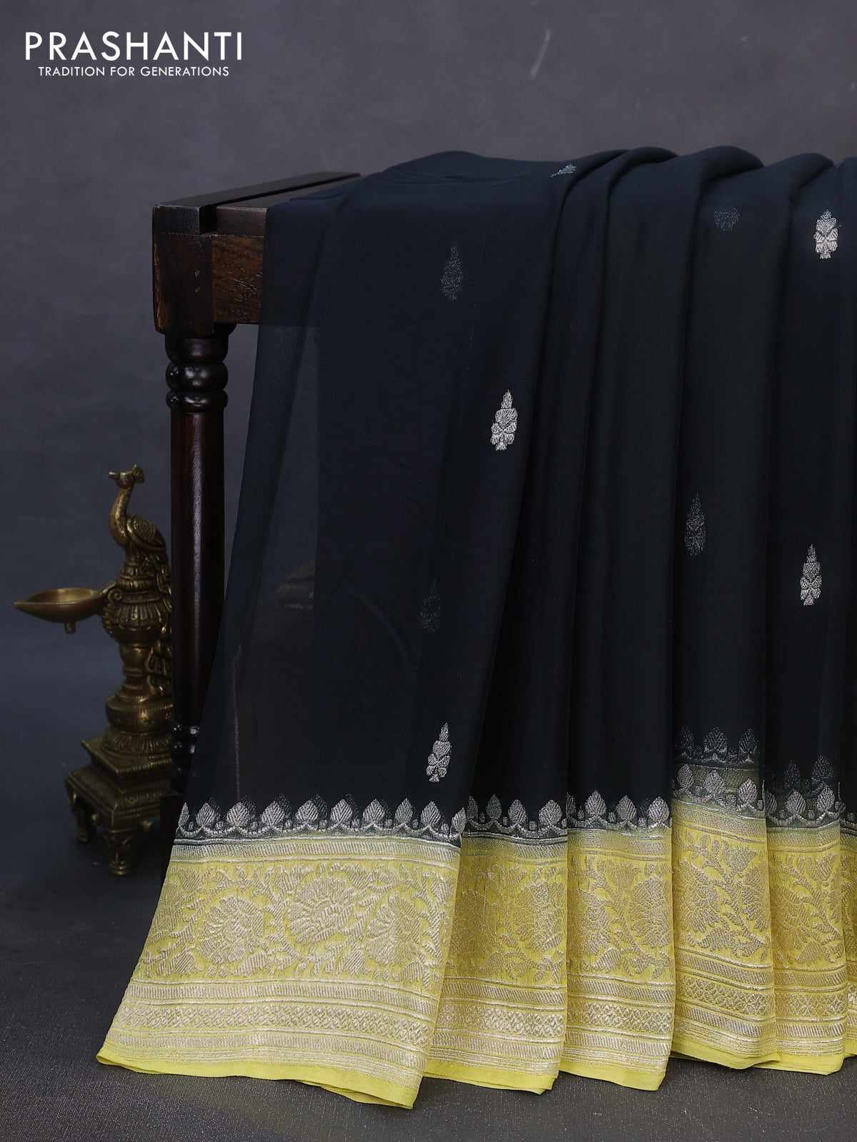 Banarasi chiffon silk saree black and pale yellow with silver zari woven buttas and silver zari woven border