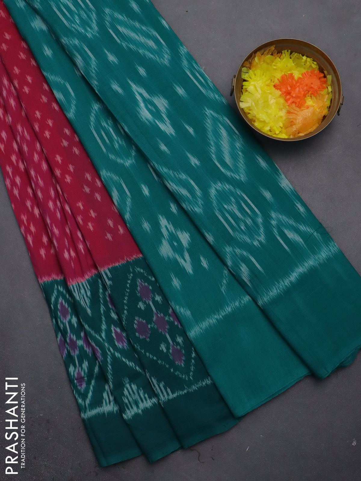 Ikat cotton saree pink and teal green with allover ikat butta weaves and simple border