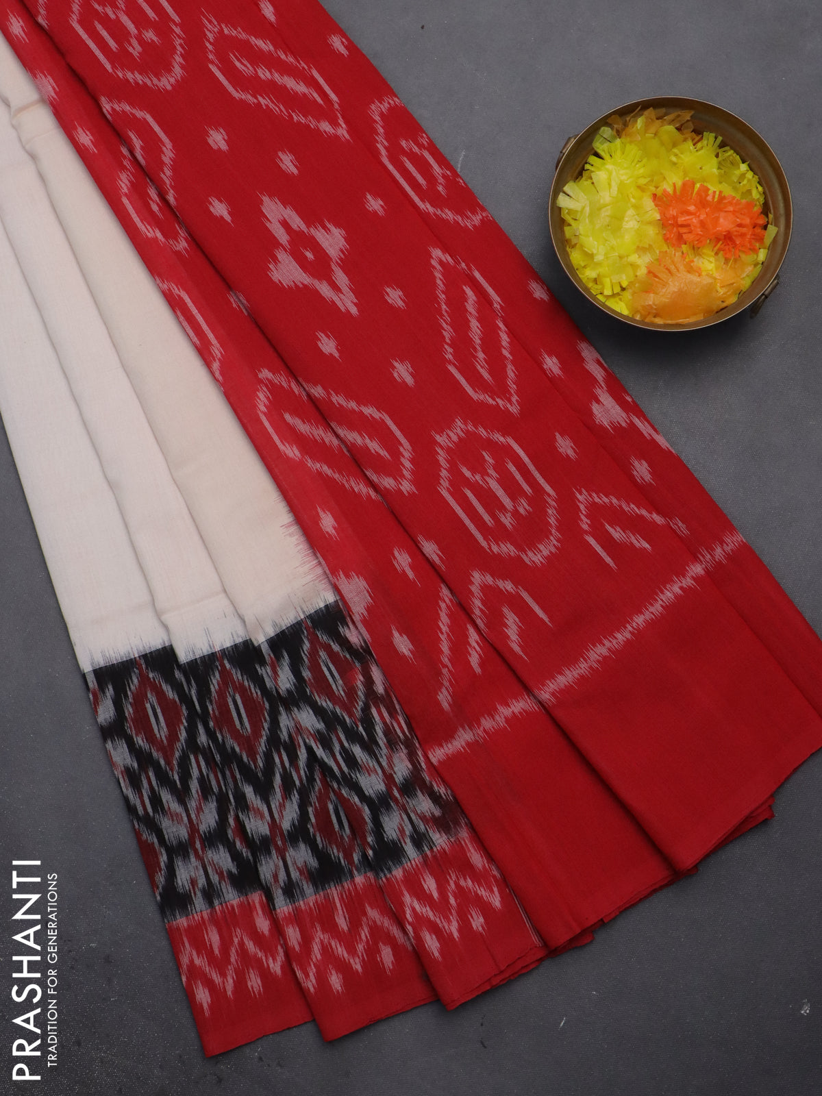 Ikat cotton saree off white and black red with plain body and long ikat style border