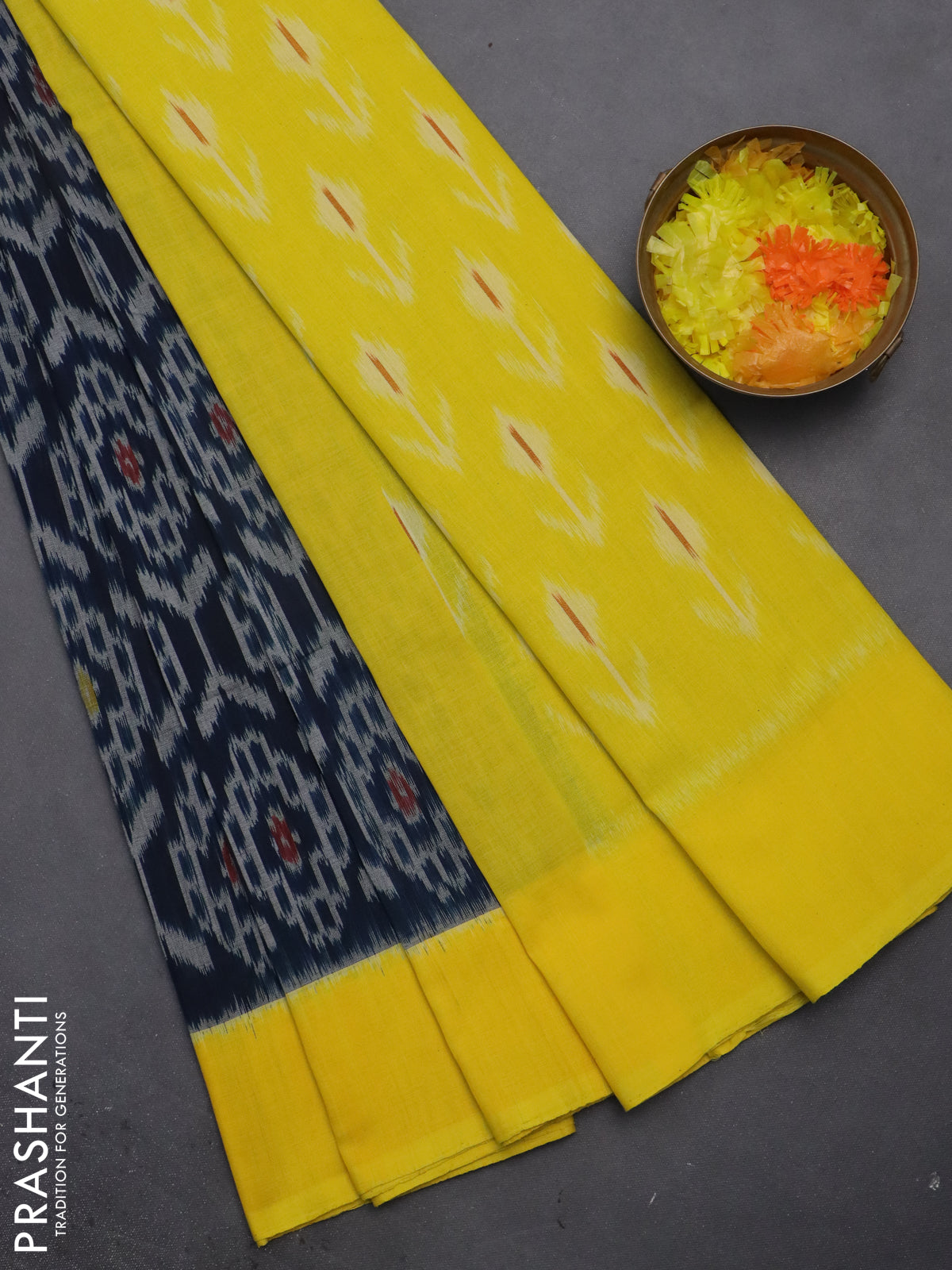 Ikat cotton saree peacock blue and yellow with allover ikat weaves and simple border