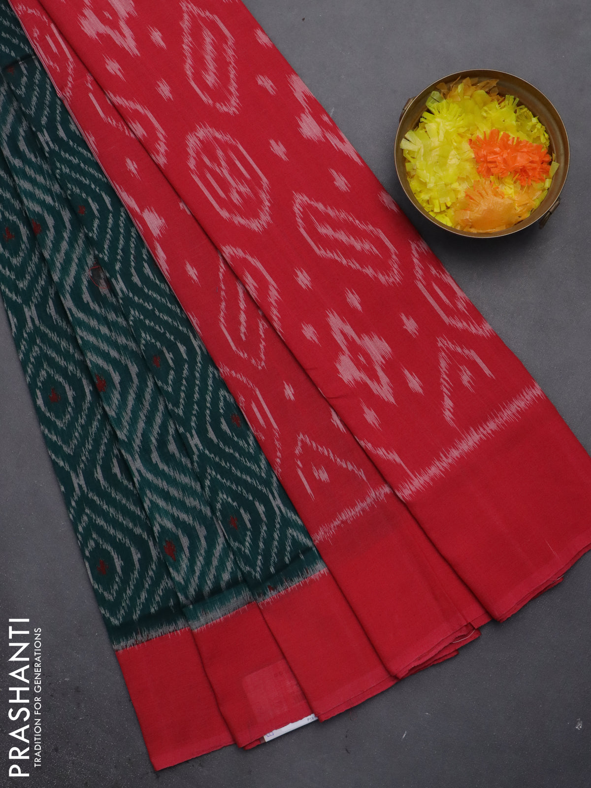 Ikat cotton saree peacock green and pink with allover ikat weaves and simple border