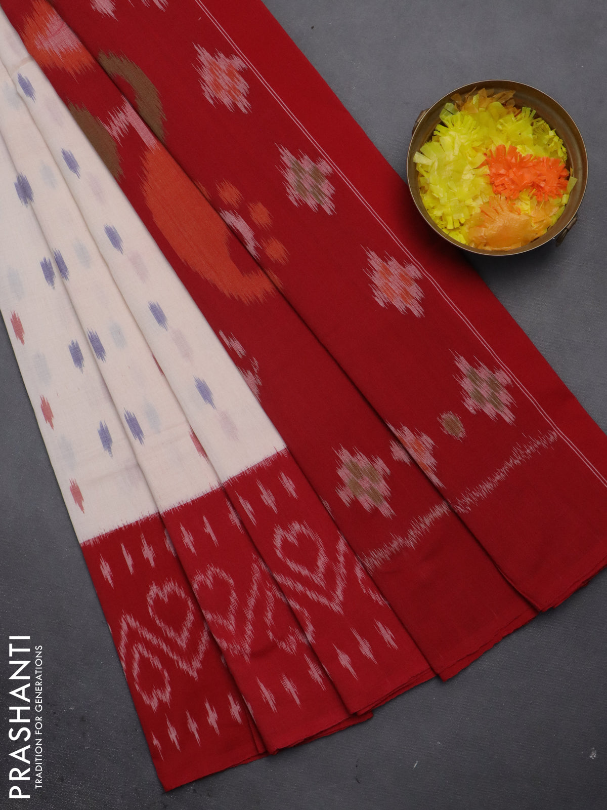 Ikat cotton saree cream and red with allover ikat butta weaves and long ikat style border