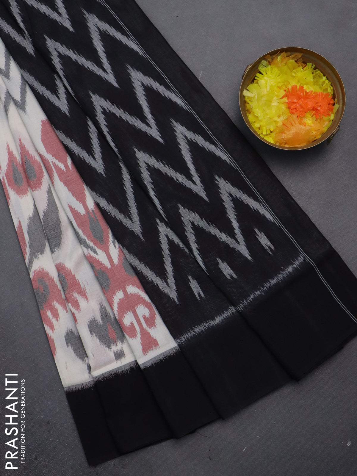 Ikat cotton saree off white and black with allover zig zag ikat weaves and simple border