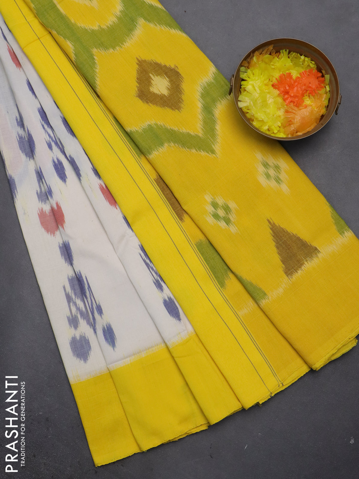 Ikat cotton saree cream with allover ikat weaves and ganga jamuna border