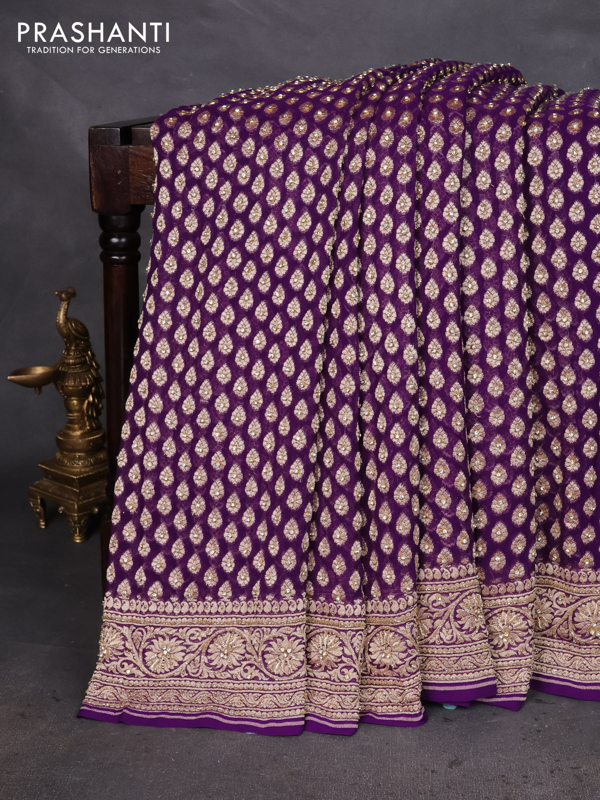 Banarasi georgette saree violet with woven buttas & stone work and zardosi work border