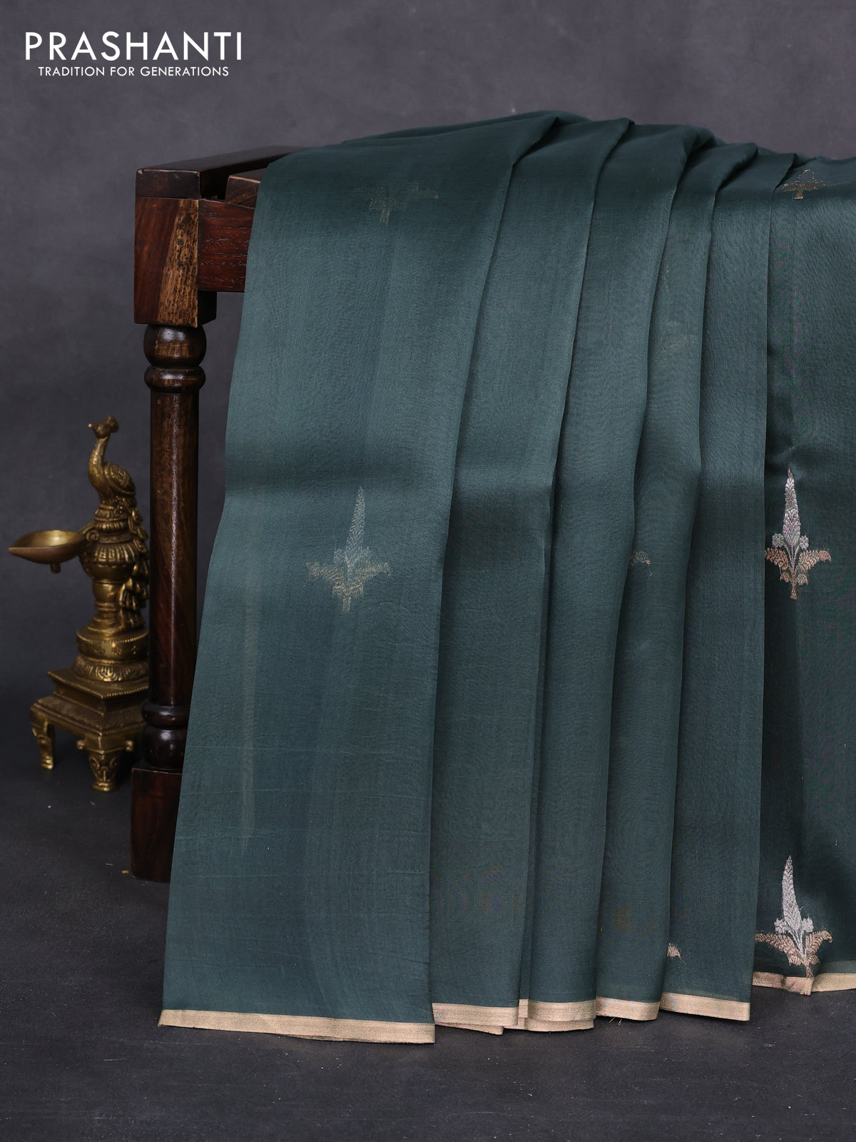 Banarasi organza silk saree greyish green with zari woven buttas and zari woven piping border