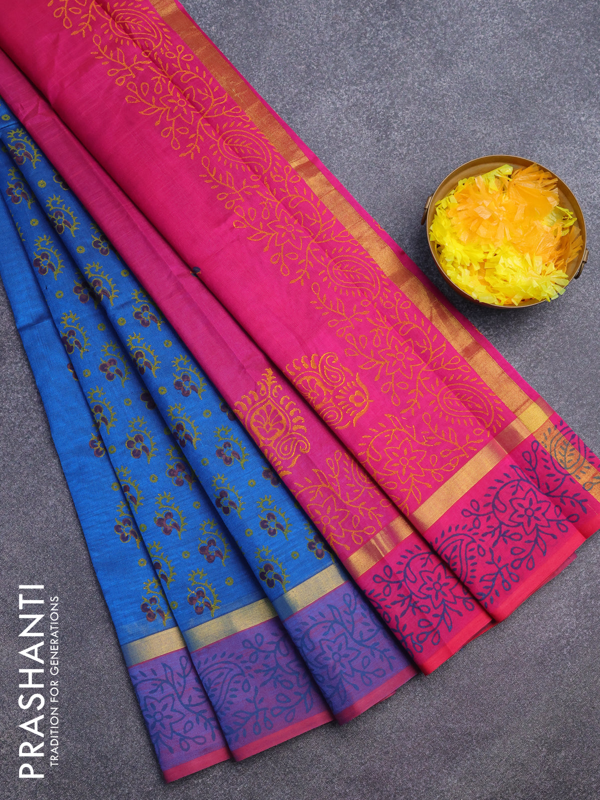 Silk cotton block printed saree cs blue and pink with allover floral butta prints and zari woven simple border