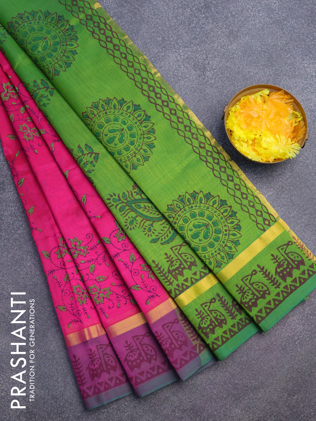 Silk cotton block printed saree pink and green with allover prints and zari woven simple border