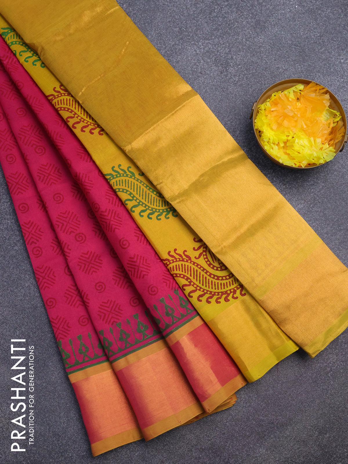 Silk cotton block printed saree pink and mustard yellow with allover butta prints and zari woven border