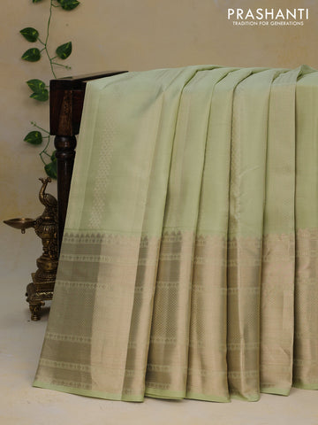 Pure kanjivaram silk saree pista green and teal blue with allover zari weaves and long zari woven border