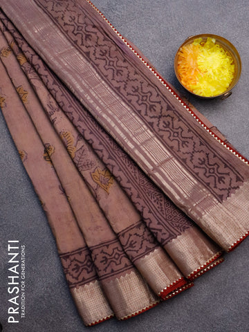 Chanderi silk cotton saree pastel brown and maroon with natural vegetable prints and zari woven gotapatti lace border