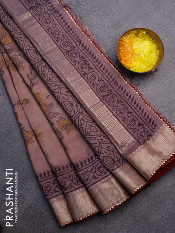 Chanderi silk cotton saree pastel brown shade and maroon with natural vegetable prints and zari woven gotapatti lace border