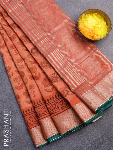 Chanderi silk cotton saree rustic oramge and green with natural vegetable prints and zari woven gotapatti lace border