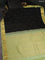 Pure kanchipuram silk saree black and pista green with allover zari weaves and zari woven korvai border