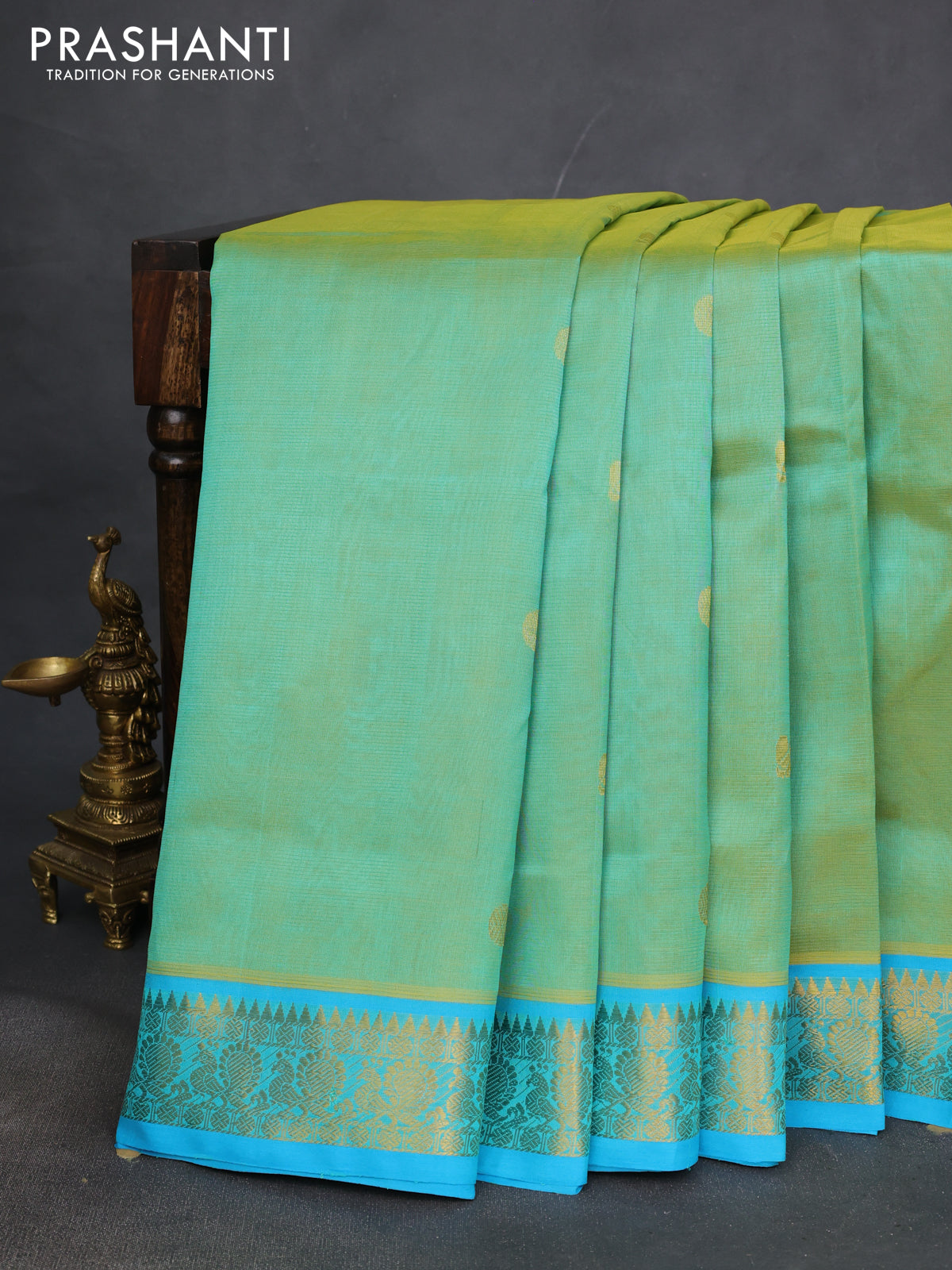 10 yards silk cotton saree dual shade of teal green and cs blue with zari woven buttas and annam zari woven border