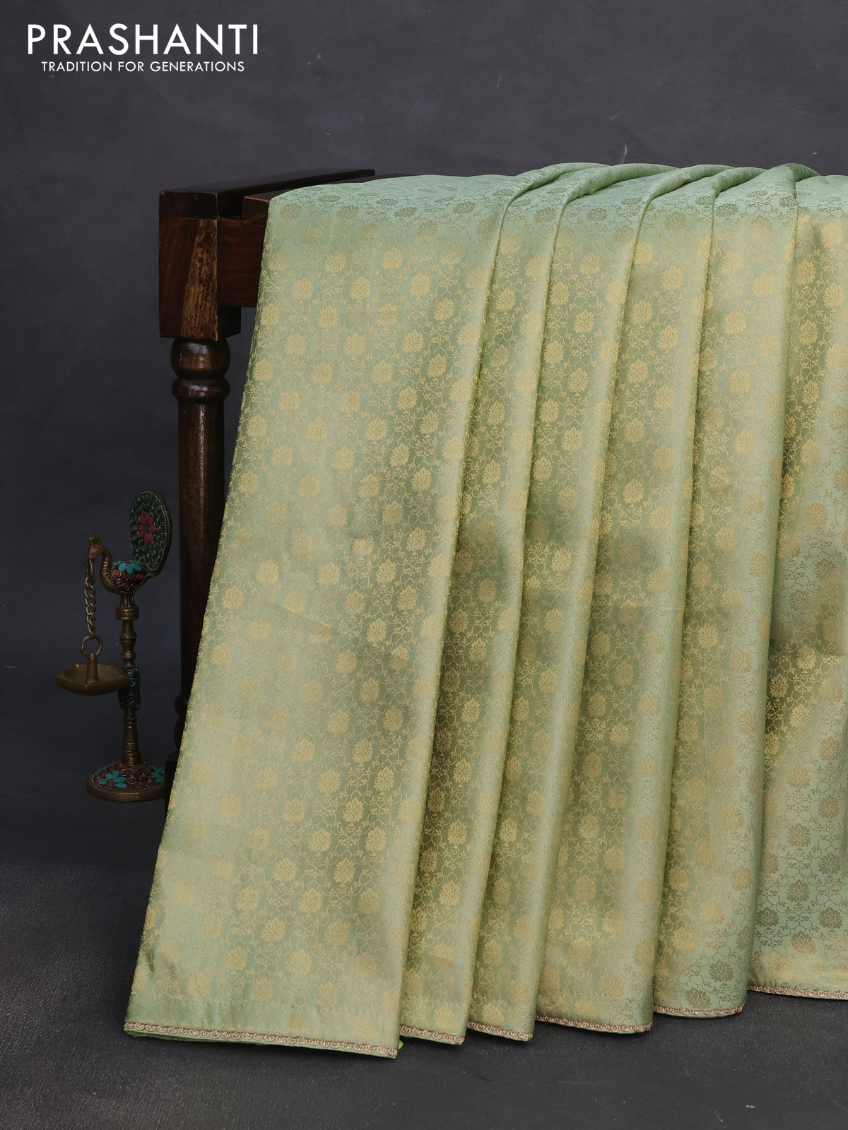 Banarasi semi crepe saree pastel green with allover zari woven brocade weaves and lace work border