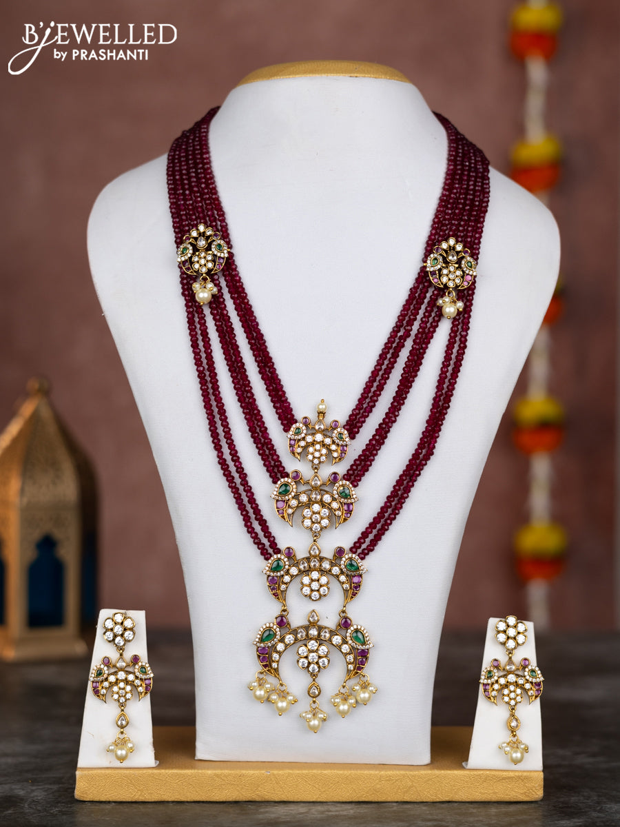 Beaded multilayer maroon necklace chandbali pendant with kemp & cz stones and pearl hangings in victorian finish