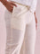 Women Solid Cream Mid Rise Cropped Metallic Pants