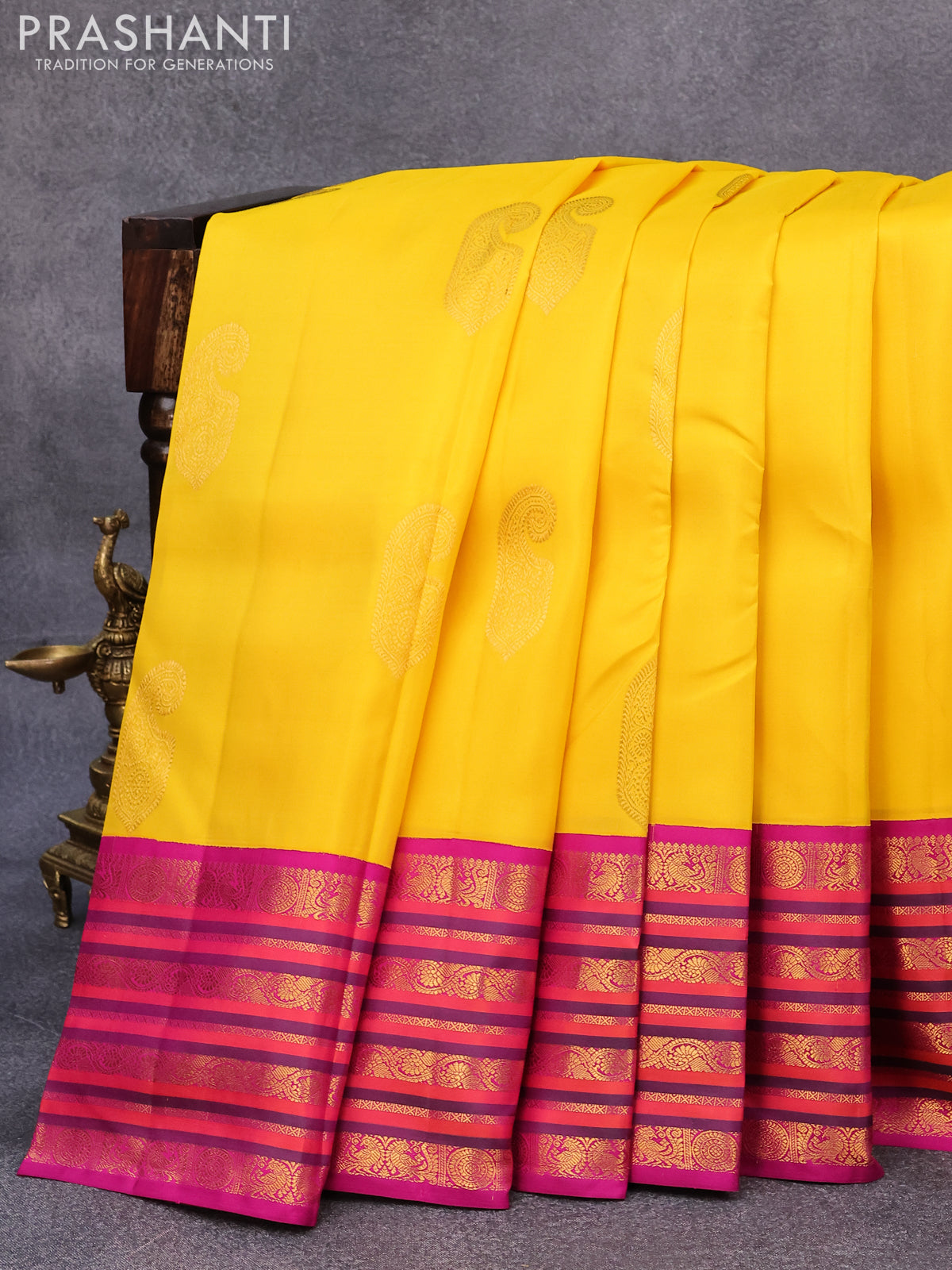 Pure kanjivaram silk saree mango yellow and purple with paisley zari woven buttas and rich annam & rudhraksha zari woven korvai border butta style