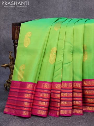 Pure kanjivaram silk saree light green and magenta pink with paisley zari woven buttas and rich annam & rudhraksha zari woven korvai border butta style