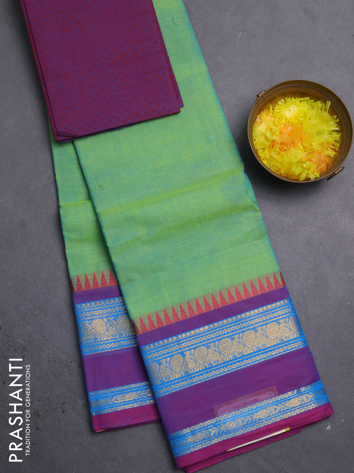 Chettinad cotton saree dual shade of light green and purple with plain body and rettapet zari woven border
