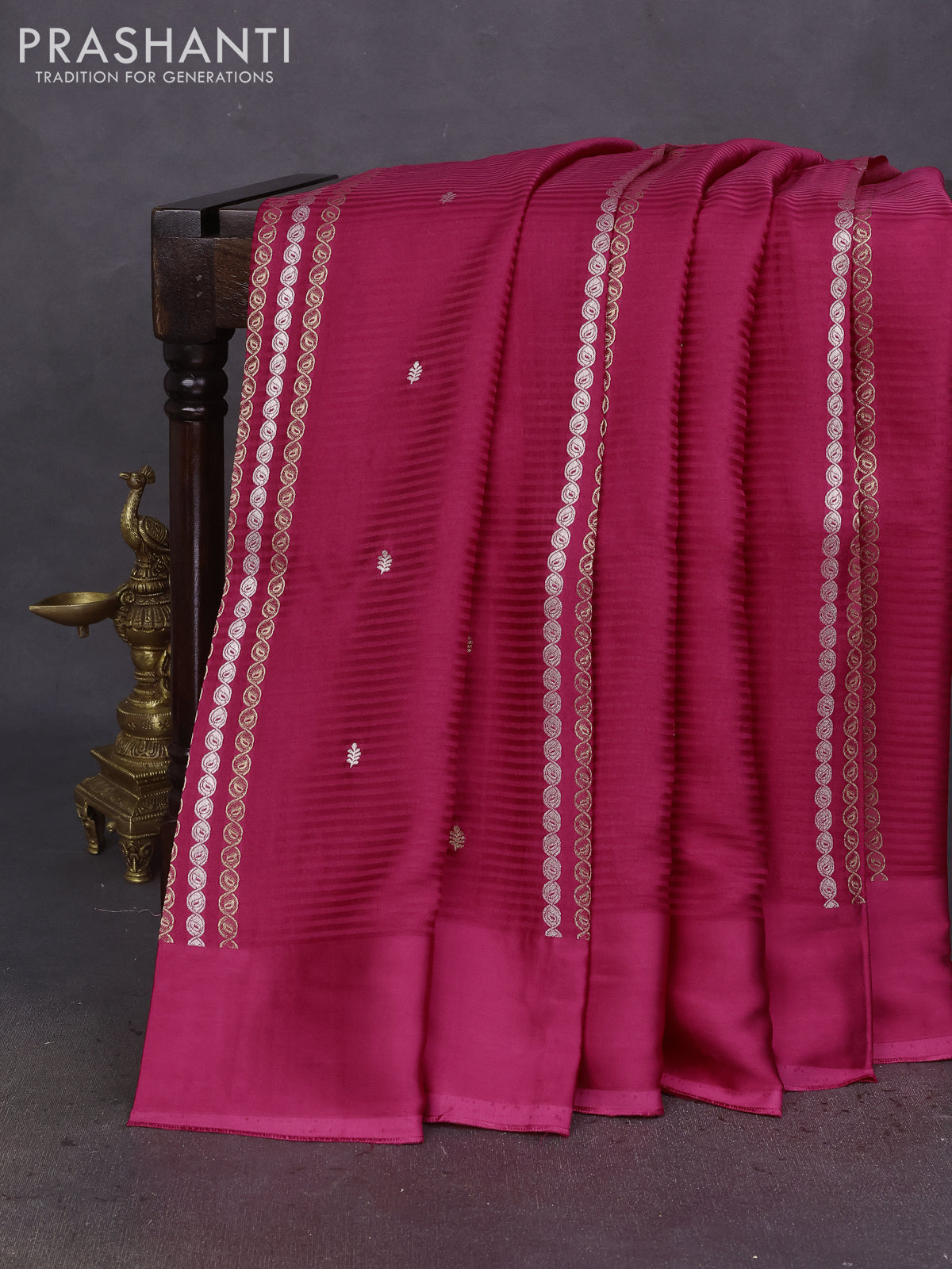Banarasi mushru silk saree pink with allover stripes pattern & zari weaves and satin border