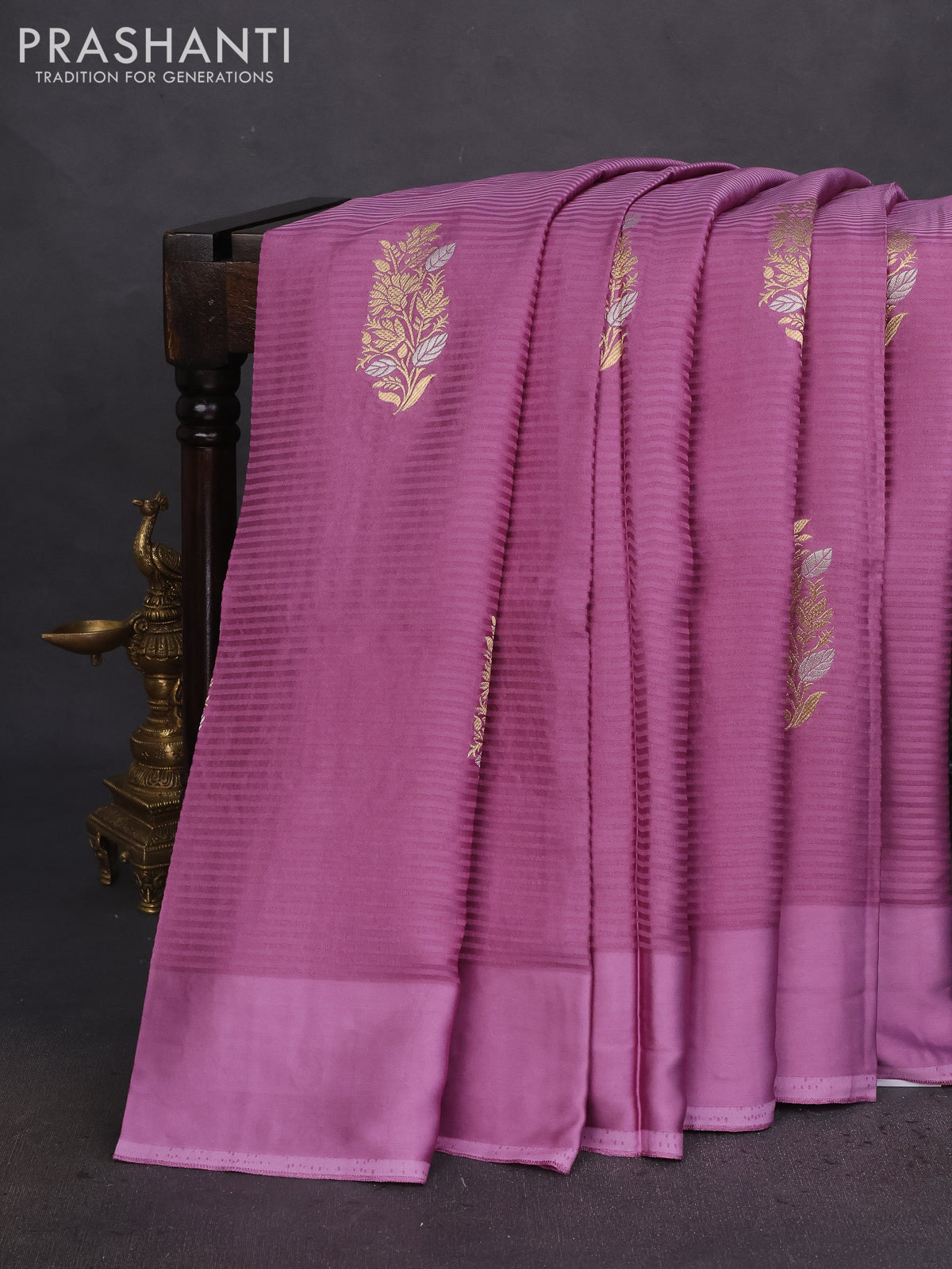 Banarasi mushru silk saree mild lavender with allover stripes pattern & zari weaves and satin border
