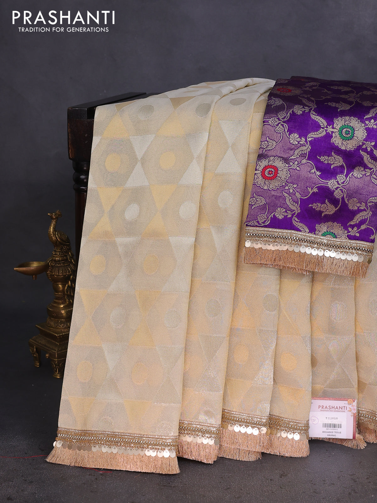 Banarasi tissue saree beige and violet with allover zari woven geometric wevaes and lace work border