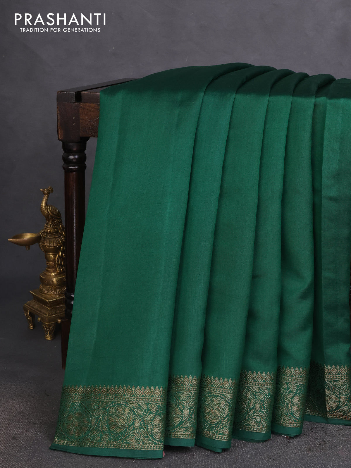 Chiniya silk saree green and maroon with plain body and woven border